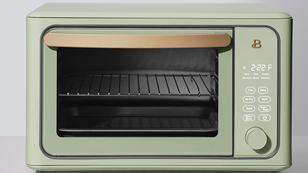 a microwave oven sitting on top of a stove