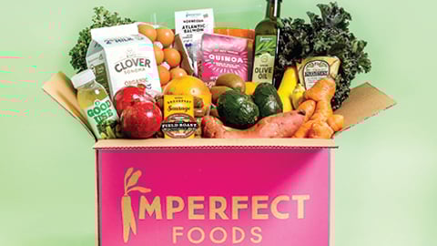 a close up of many different vegetables on display