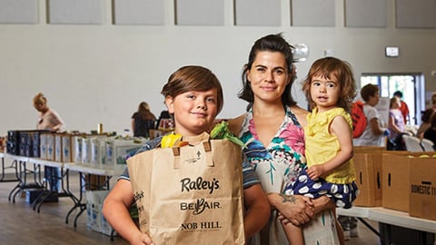 a family with groceries