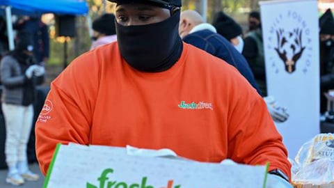 a man holding a sign