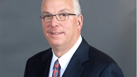 a man wearing a suit and tie