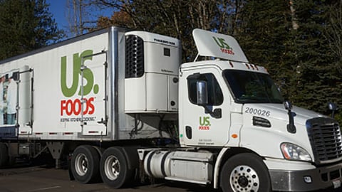 a truck is parked on the side of a road