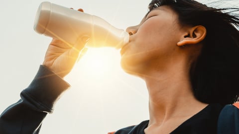 person,outdoor,man,woman,looking,holding,standing,wearing,orange,glasses,young,people,water,food,playing,phone,video