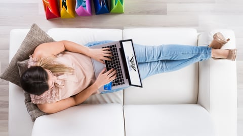 a person sitting on a bed