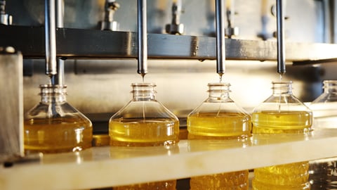 a group of glass bottles on a counter