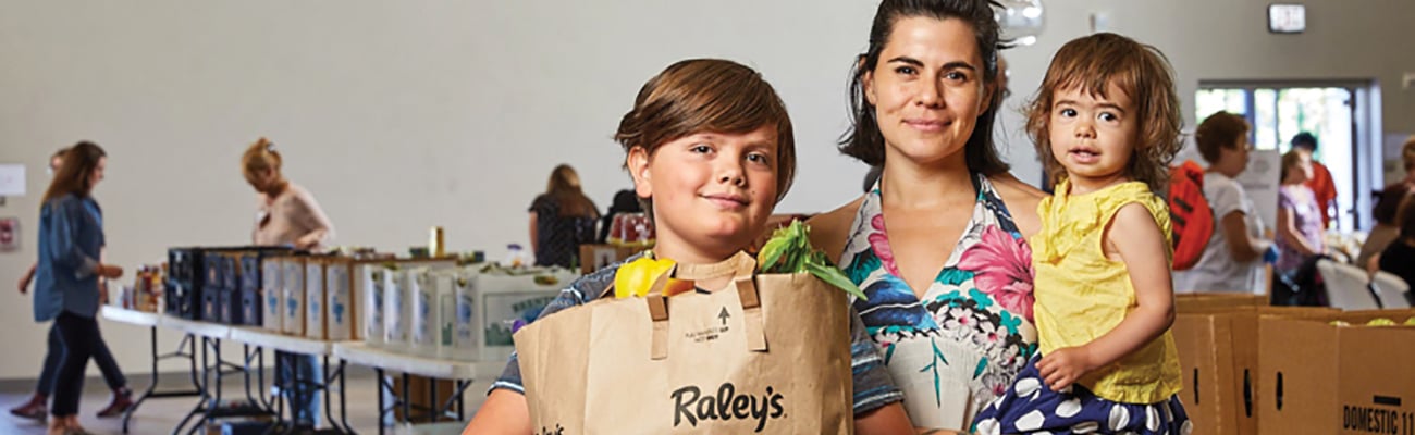 a family with groceries