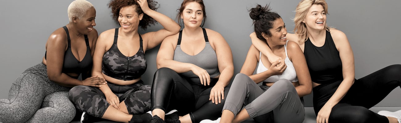 women sitting in front of camera