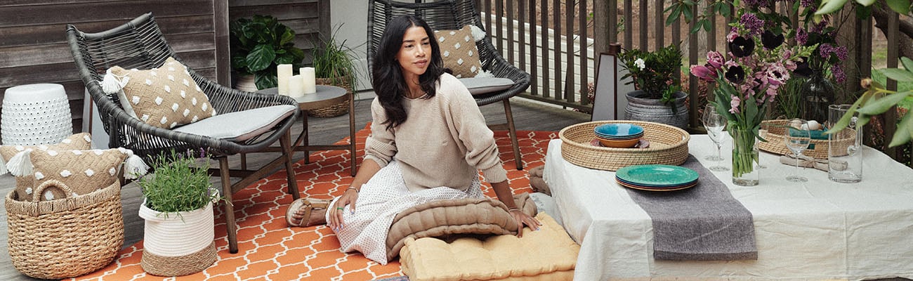 Hannah Bronfman sitting on a table