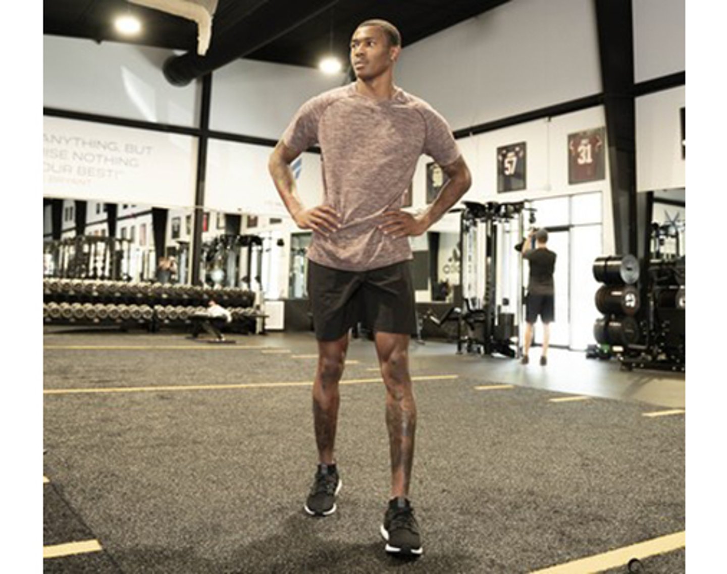 man standing in gym