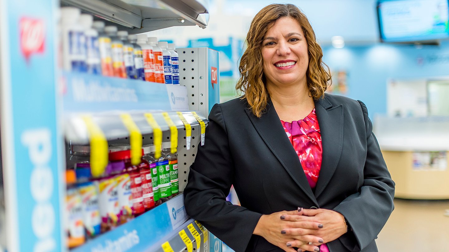 A woman in a drug aisle