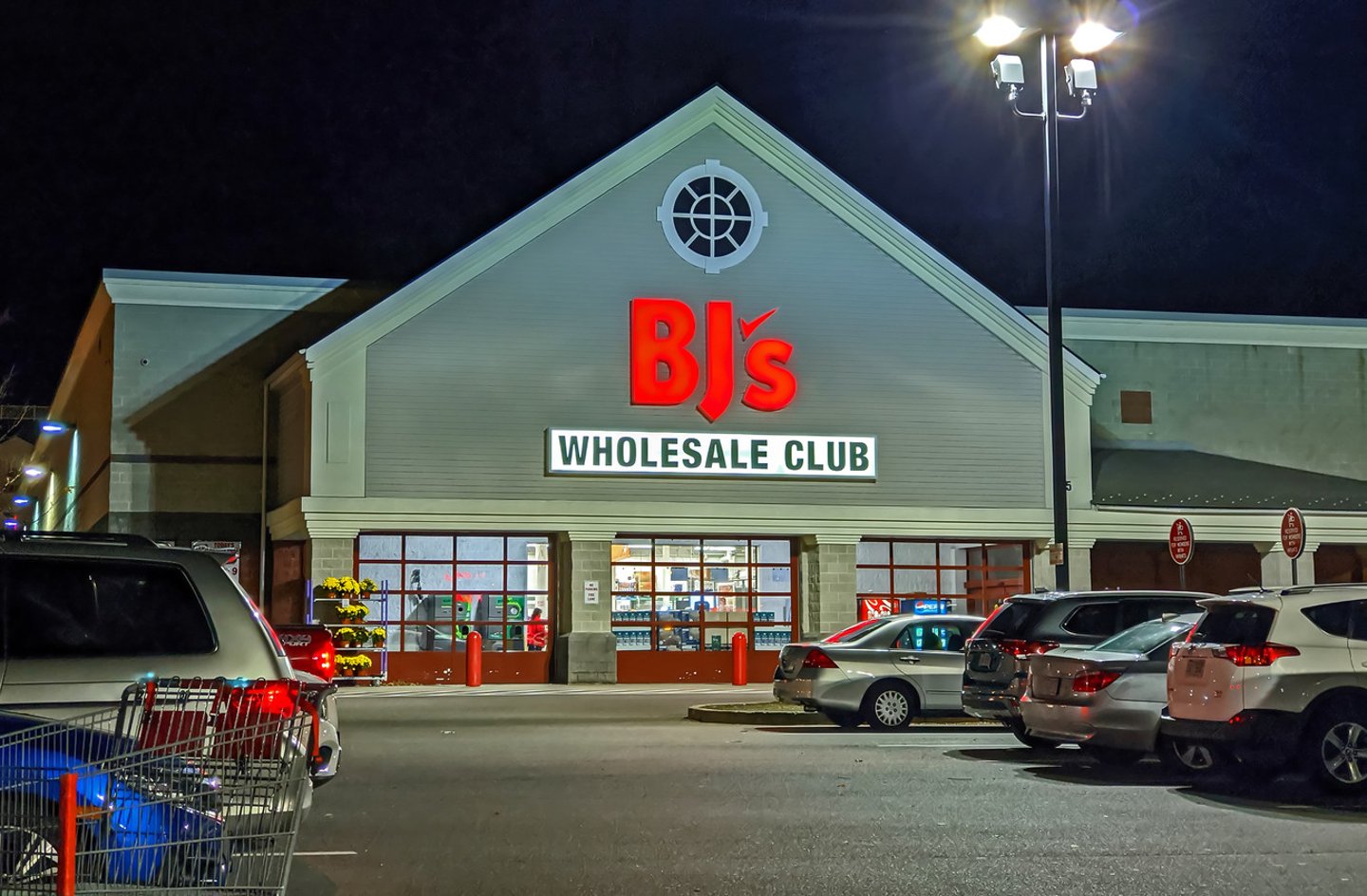 .BJ's wholesale membership club storefront, late night hours, Revere Massachusetts USA, November 1, 2019; Shutterstock ID 1551340898