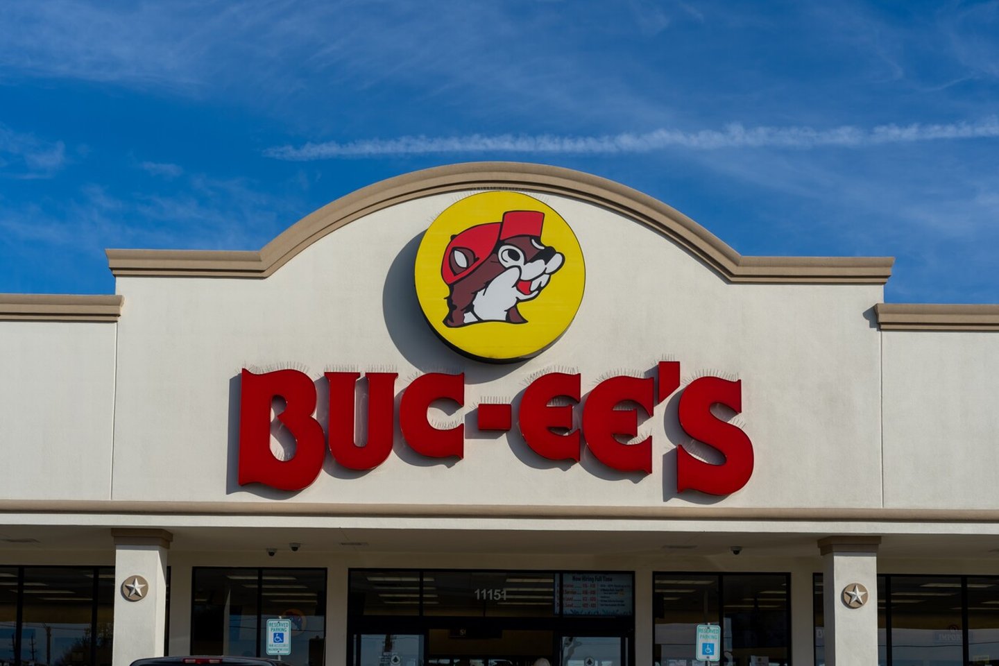 Houston, Texas, USA - February 14, 2022: Closeup of Buc-ee's sign on the building with blue sky in background. Buc-ee's is a chain of travel centers. ; Shutterstock ID 2245163537