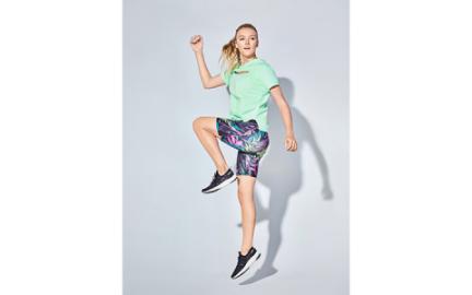 a woman in athletic wear
