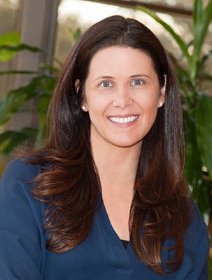 a woman smiling for the camera