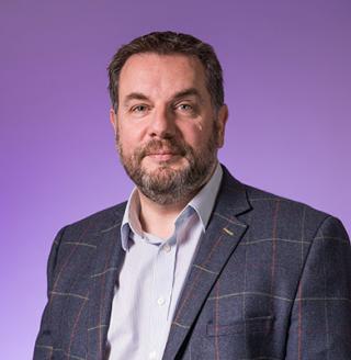 a man wearing a suit and tie