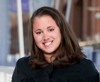 a woman smiling for the camera