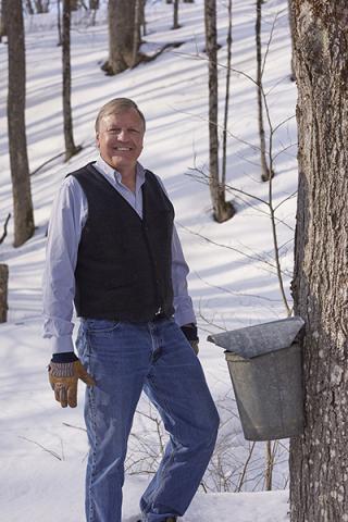 a person that is standing in the snow