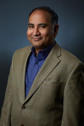 a man wearing a suit and tie