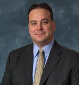a man wearing a suit and tie