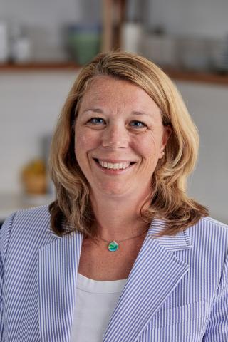 a person smiling for the camera