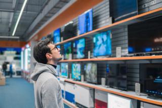 Shopper buying a television