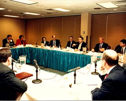 a group of people sitting at a table