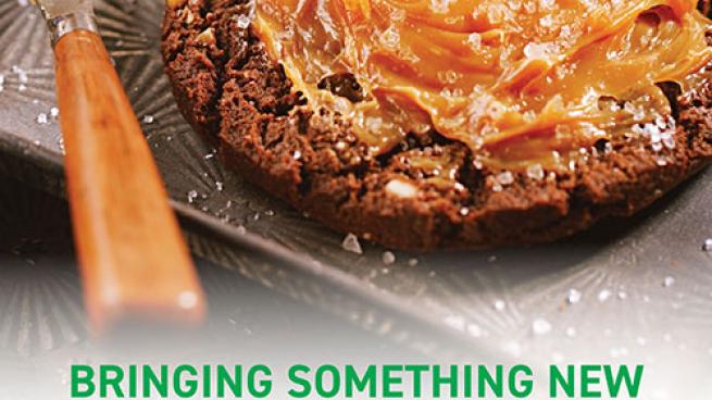 a piece of cake sitting on top of a cutting board